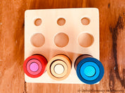Cylinder block puzzle, an educational Montessori tool for developing spatial awareness and fine motor skills.