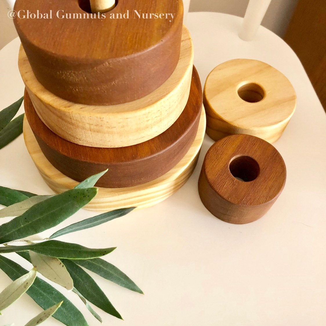 Natural Stripe Wooden Stacker: Wooden stacker with stained stripes for open play.