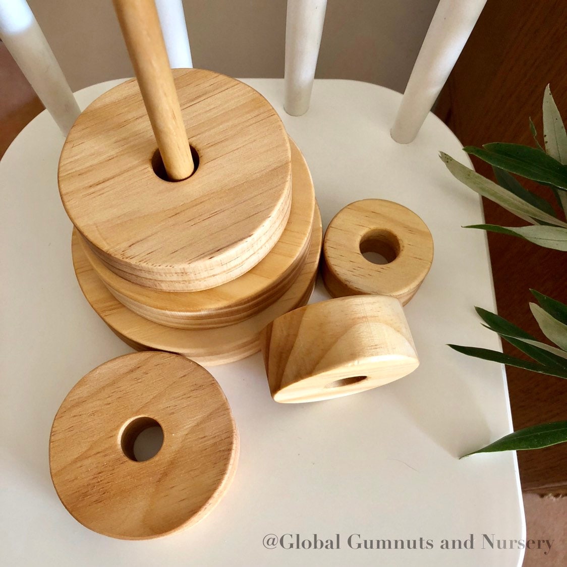 Natural Wooden Stacker: Customizable stacker with a personalized name option.