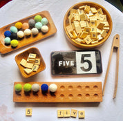 1-10 Wooden Number Tiles: Wooden tiles for number recognition and counting practice.