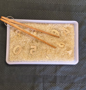 Wooden springy tongs, chopstick-like fun for kids or kitchen use.