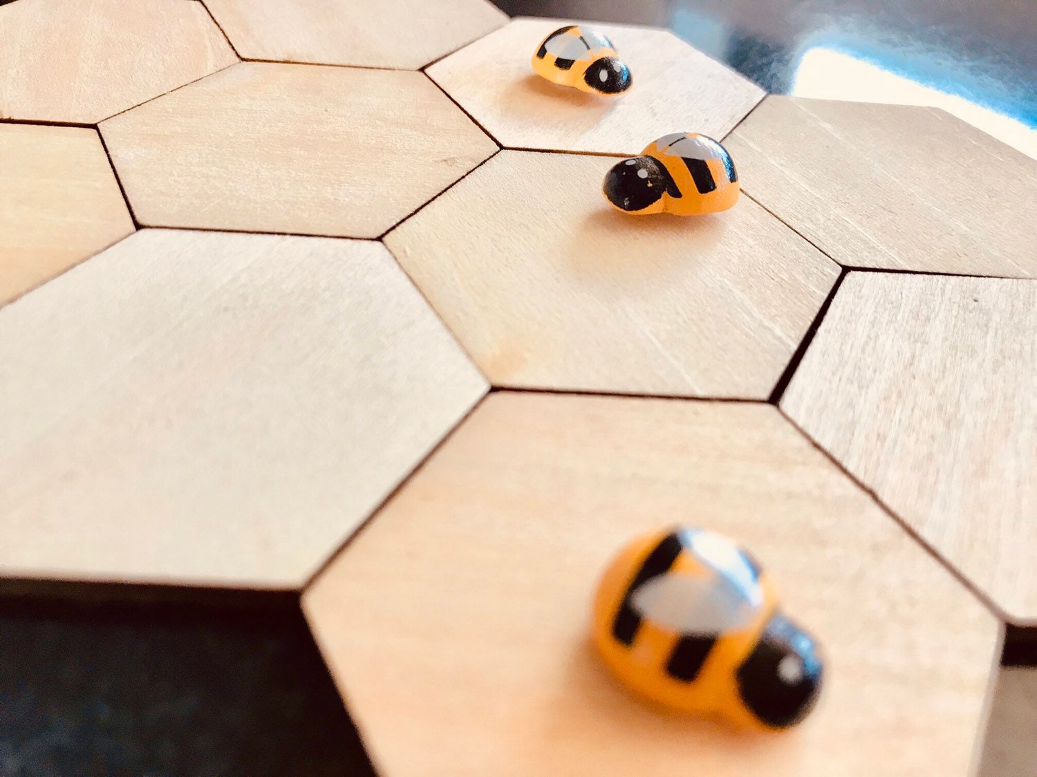 Wooden Hexagonal Tiles: 4cm wooden tiles shaped like honeycomb pieces.