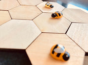Wooden Hexagonal Tiles: 4cm wooden tiles shaped like honeycomb pieces.