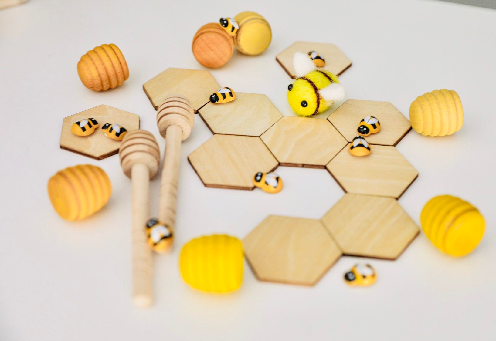 Wooden Hexagonal Tiles: 4cm wooden tiles shaped like honeycomb pieces.