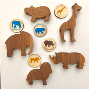 Matching animal game with wooden discs, a Montessori-inspired matching toy.
