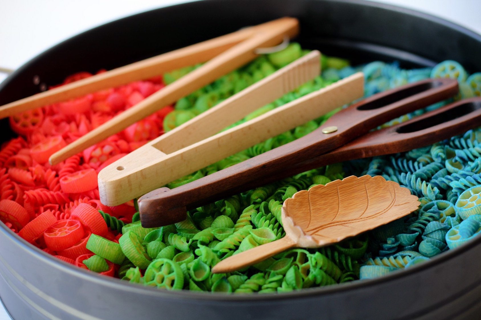 Natural Wood Leaf Spoon: Wooden scoop shaped like a leaf for sensory and craft play.