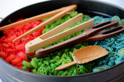 Natural Wood Leaf Spoon: Wooden scoop shaped like a leaf for sensory and craft play.