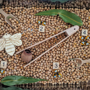 1-10 Wooden Number Tiles: Wooden tiles for number recognition and counting practice.