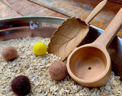 Natural Wood Leaf Spoon: Wooden scoop shaped like a leaf for sensory and craft play.