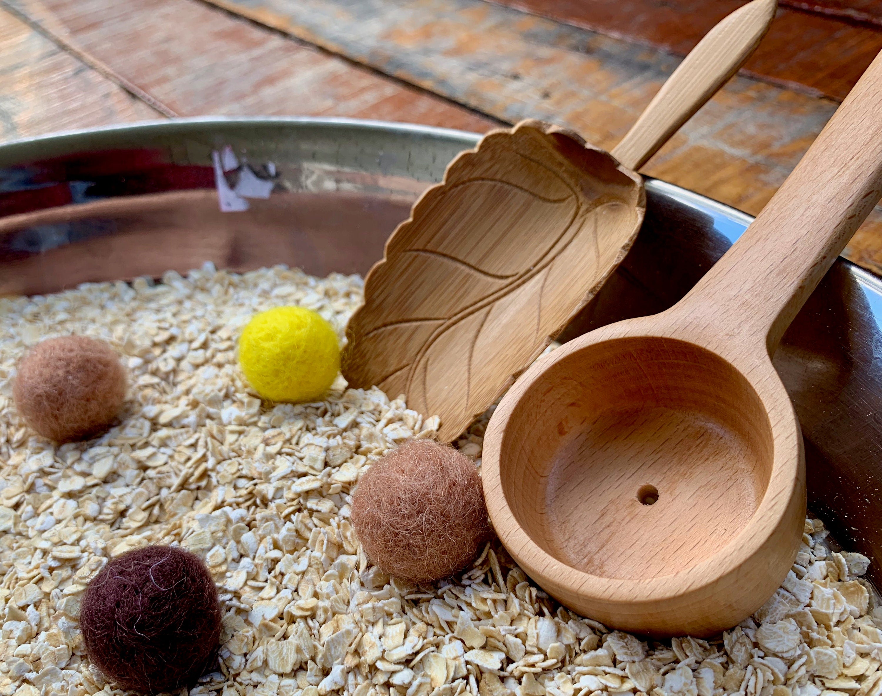 Natural Wood Leaf Spoon: Wooden scoop shaped like a leaf for sensory and craft play.