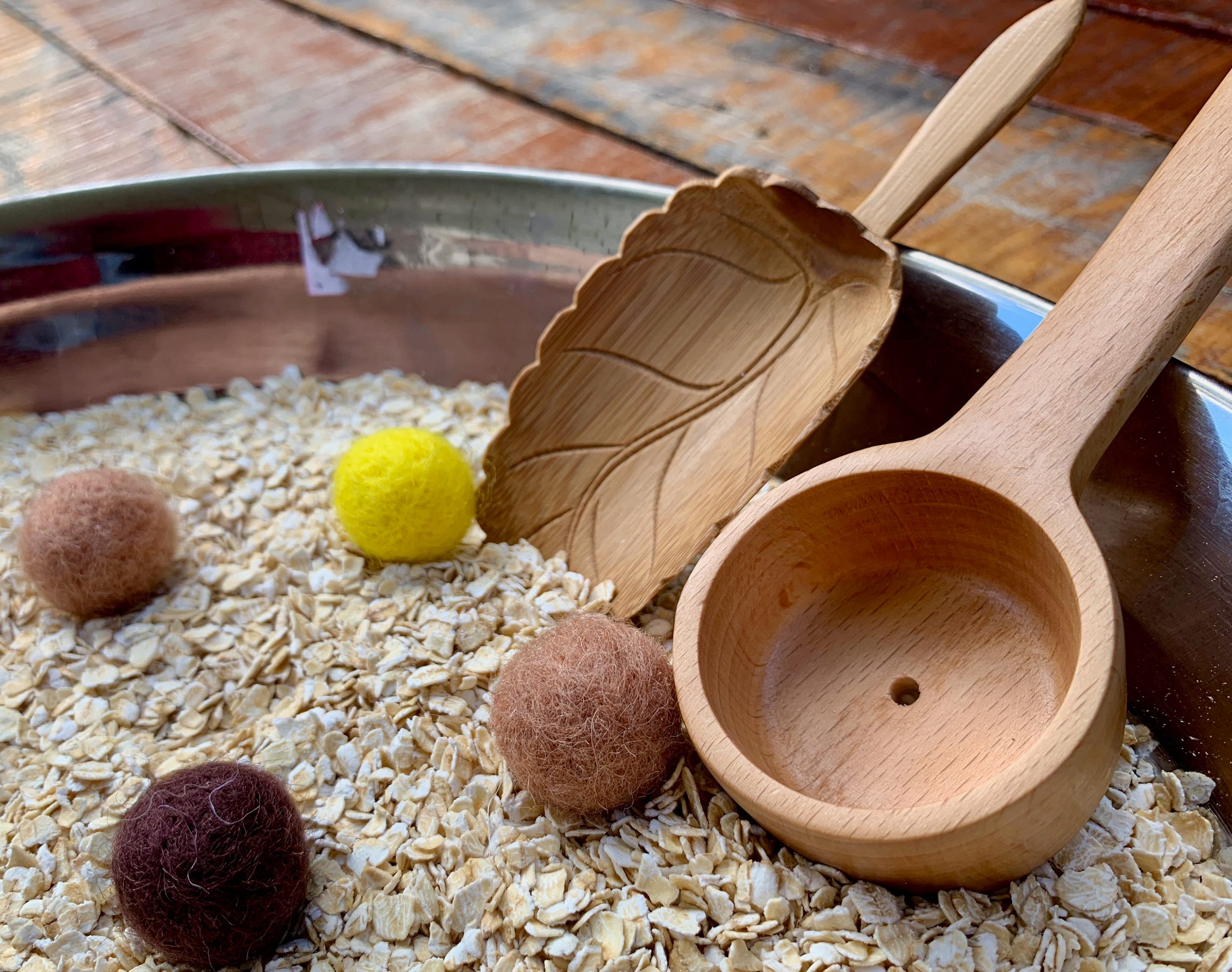 Natural Wood Leaf Spoon: Wooden scoop shaped like a leaf for sensory and craft play.