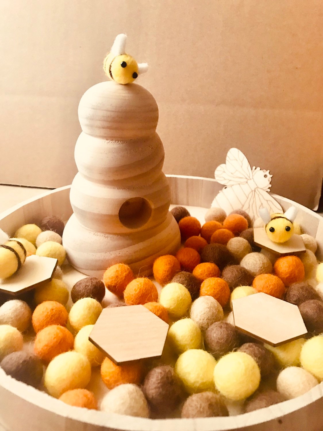 Natural Wooden Bee Hive: Small, handmade beehive for small world play and crafts.