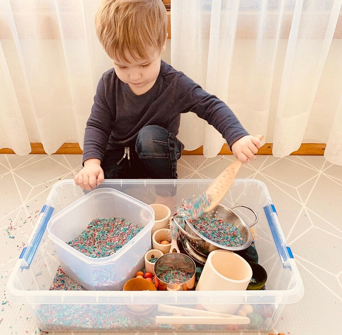Wooden Fish Spoon: Sensory tool shaped like a fish for scooping and play.