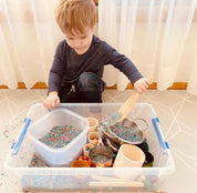 Wooden Fish Spoon: Sensory tool shaped like a fish for scooping and play.