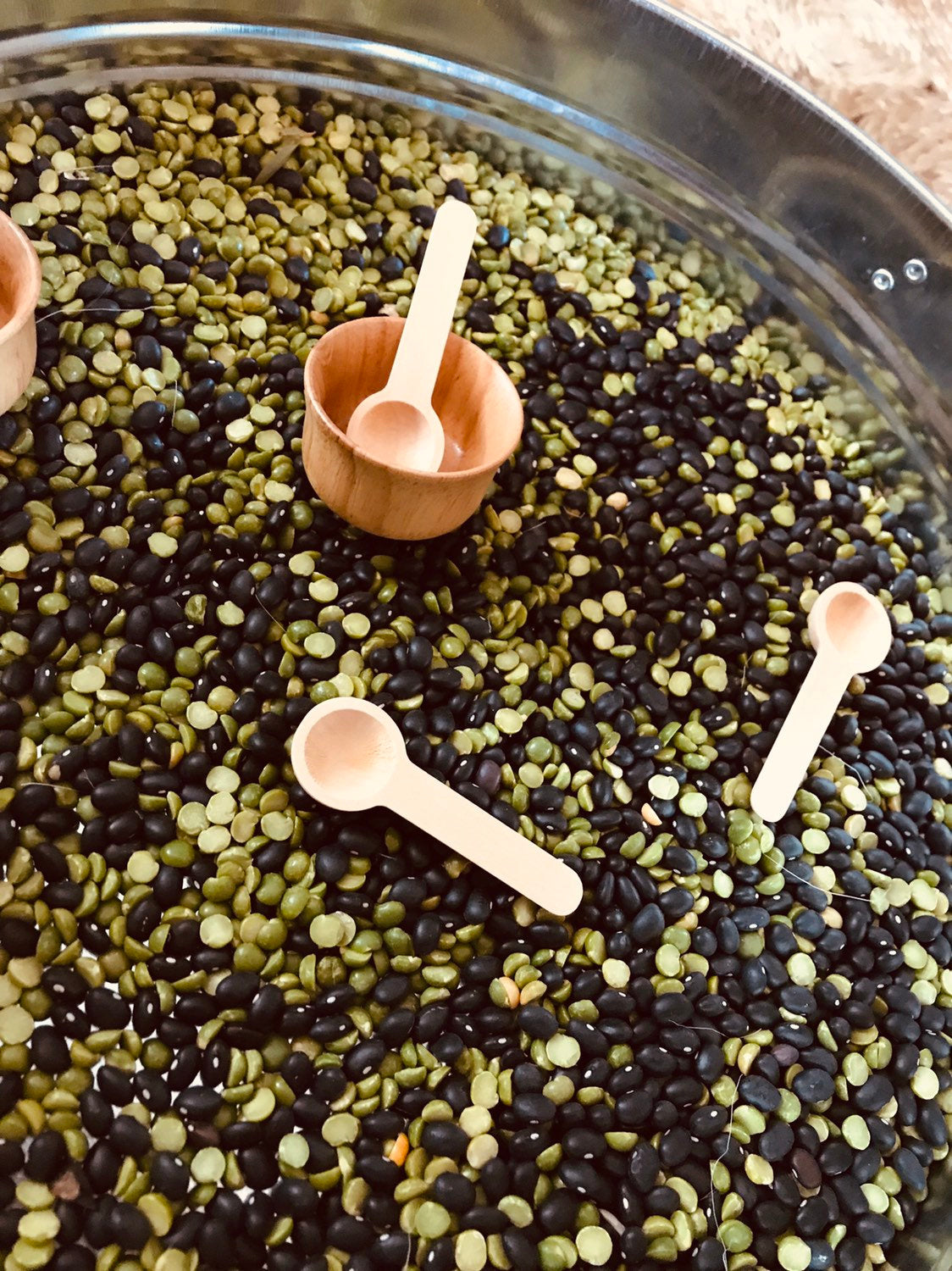 Teaspoon Scoops – Mini Natural Child: Small wooden scoops for sensory play and exploration.