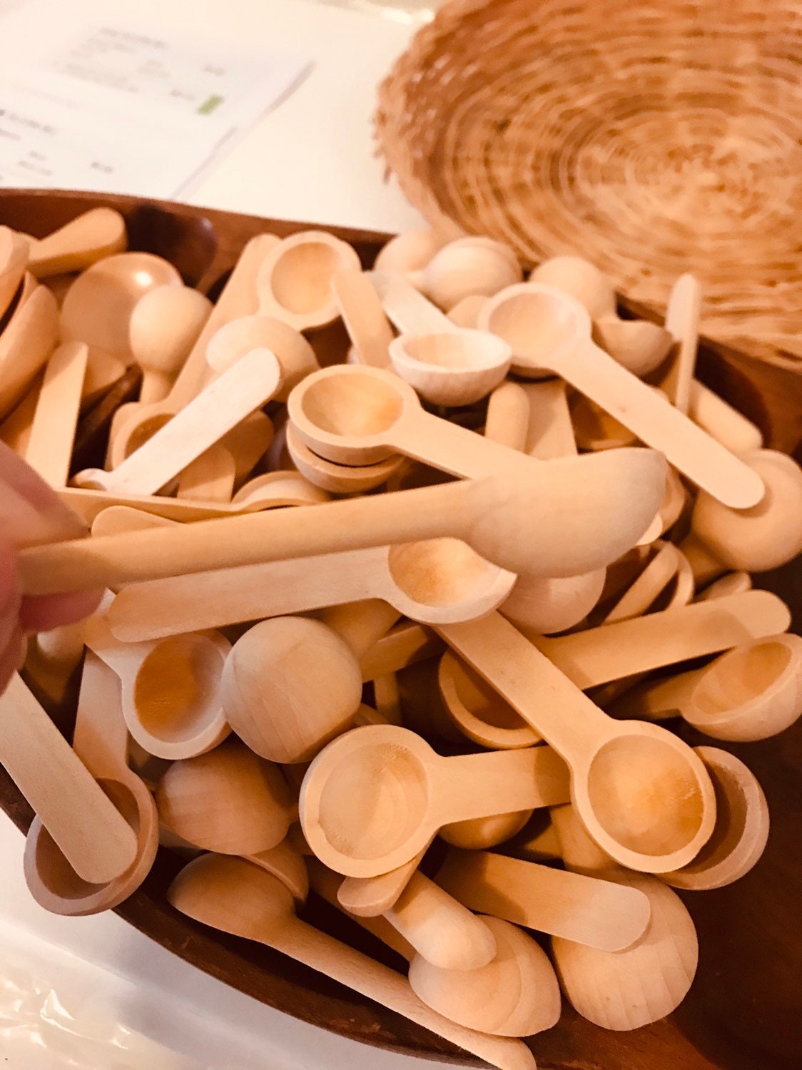 Teaspoon Scoops – Mini Natural Child: Small wooden scoops for sensory play and exploration.