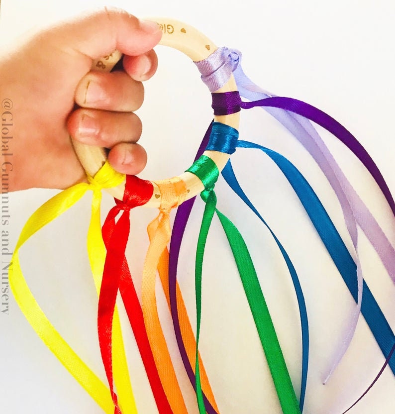 Ribbon Dancing Bells: Colourful musical chimes with ribbons for creative dance and play.