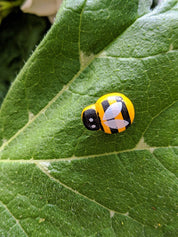 Mini Wooden Bees: Small wooden bee figurines for creative play.