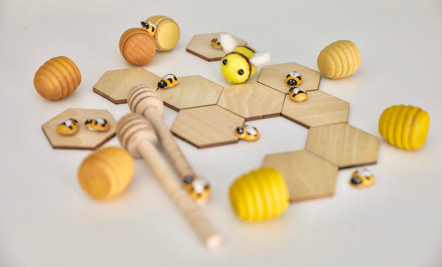 Wooden Hexagonal Tiles: 4cm wooden tiles shaped like honeycomb pieces.