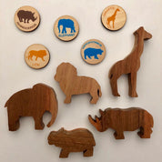 Matching animal game with wooden discs, a Montessori-inspired matching toy.
