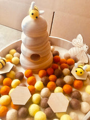 Natural Wooden Bee Hive: Small, handmade beehive for small world play and crafts.