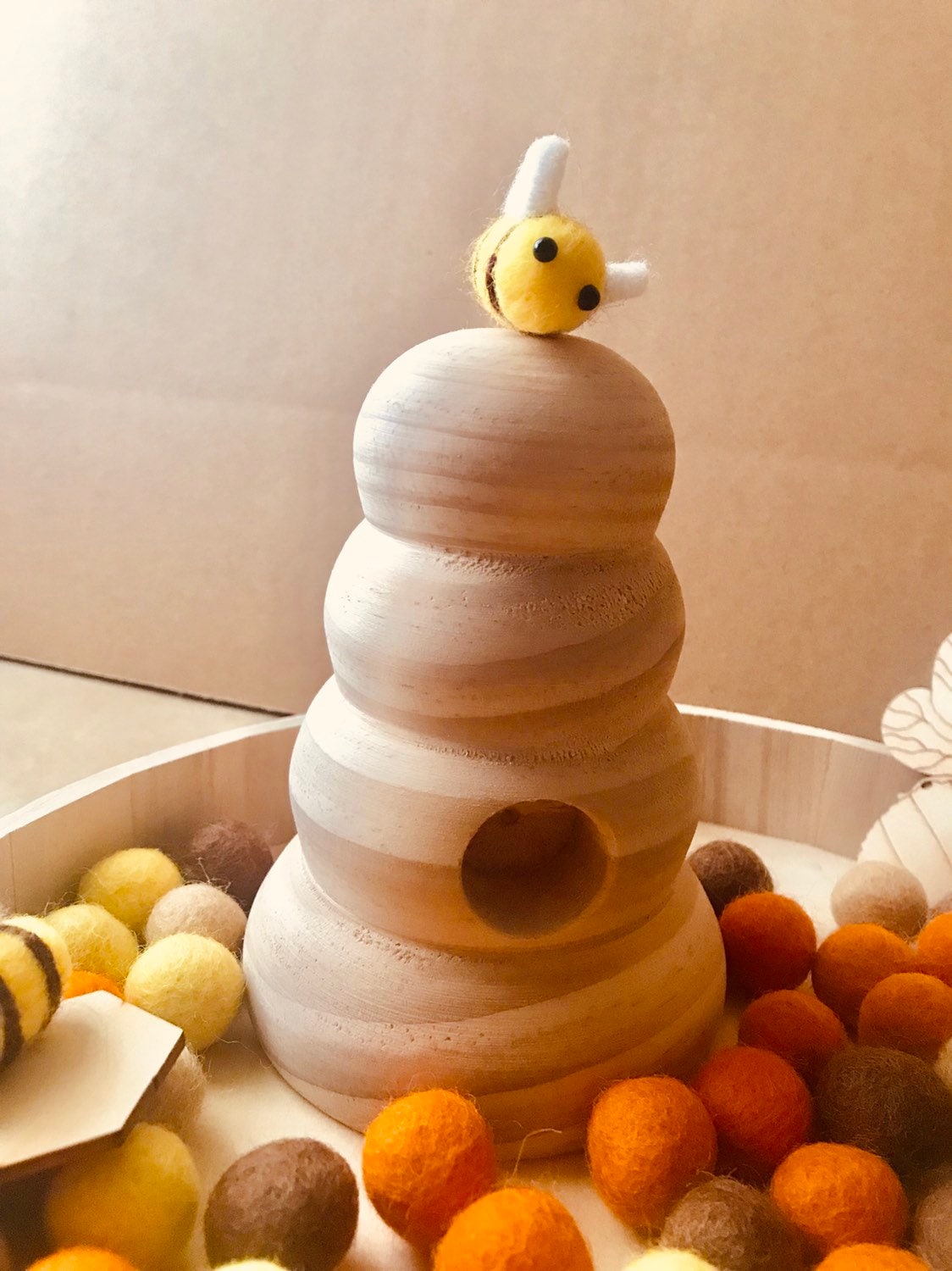 Natural Wooden Bee Hive: Small, handmade beehive for small world play and crafts.