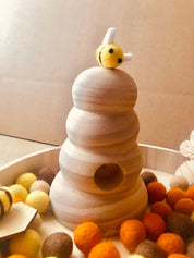 Natural Wooden Bee Hive: Small, handmade beehive for small world play and crafts.
