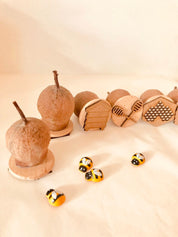 Honeybee Stamp Set: Eight-piece Gumnut stamp set with a beekeeping theme.