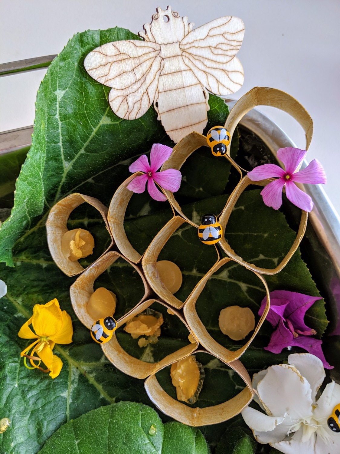Mini Wooden Bees: Small wooden bee figurines for creative play.