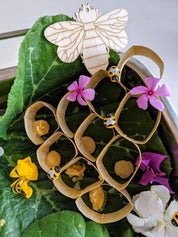 Mini Wooden Bees: Small wooden bee figurines for creative play.