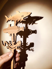 Individual wooden Australian animal puppets featuring emu, koala, crocodile, and more for play or storytelling.