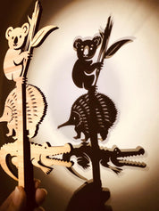 Individual wooden Australian animal puppets featuring emu, koala, crocodile, and more for play or storytelling.