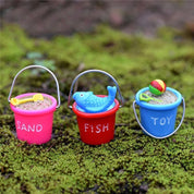 Miniature beach buckets for small-world play. Perfect for imaginative beach or summer-themed setups.