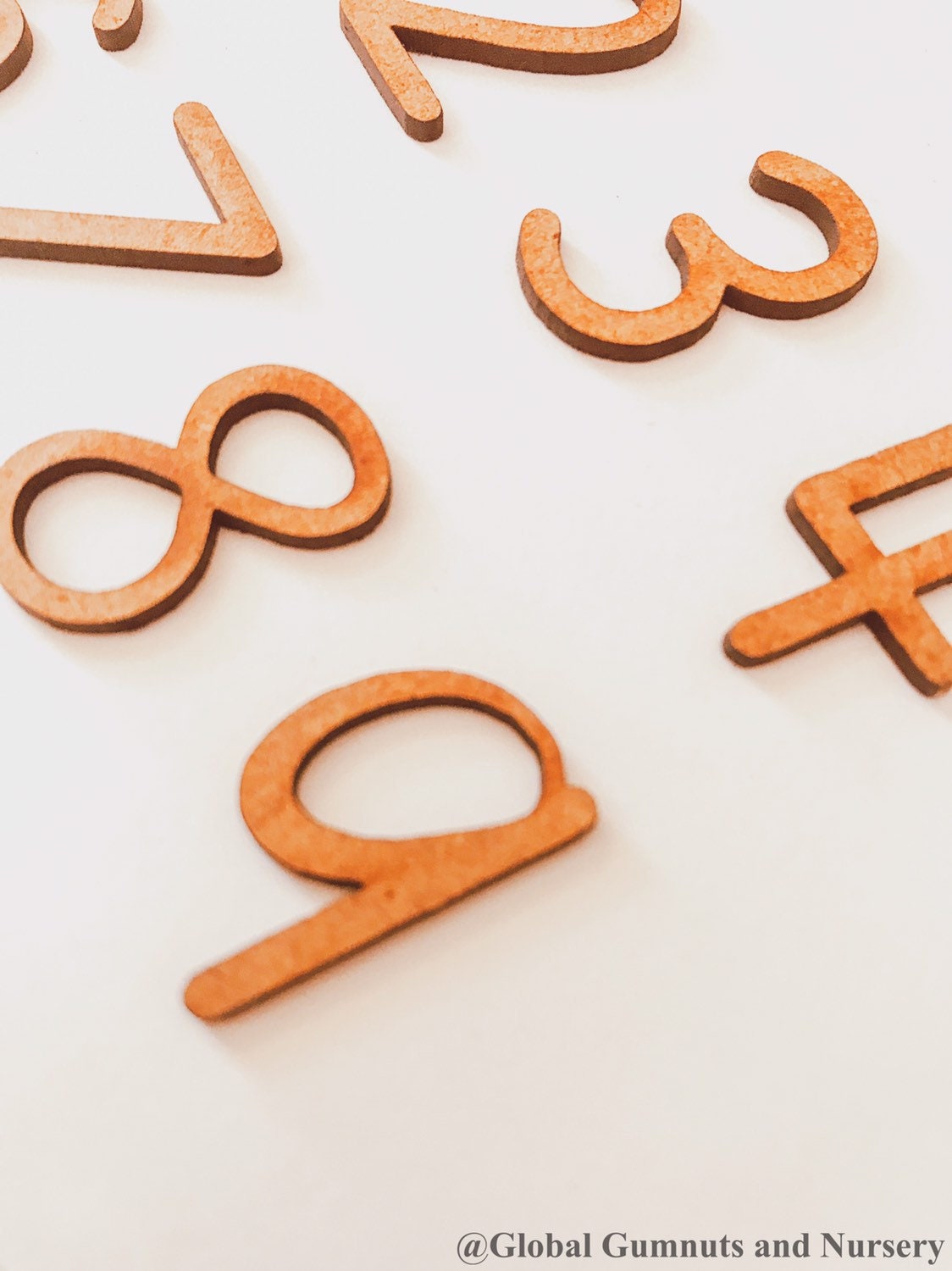 0-9 Wooden Number Set: Ten-piece set of wooden numbers for learning and play.
