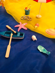 Miniature beach buckets for small-world play. Perfect for imaginative beach or summer-themed setups.