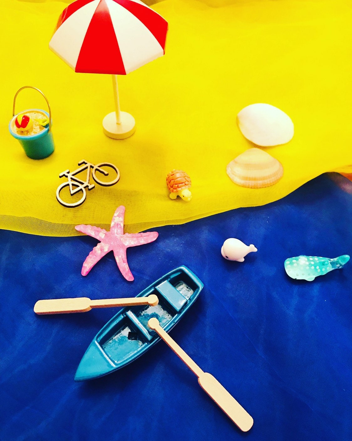 Miniature beach buckets for small-world play. Perfect for imaginative beach or summer-themed setups.