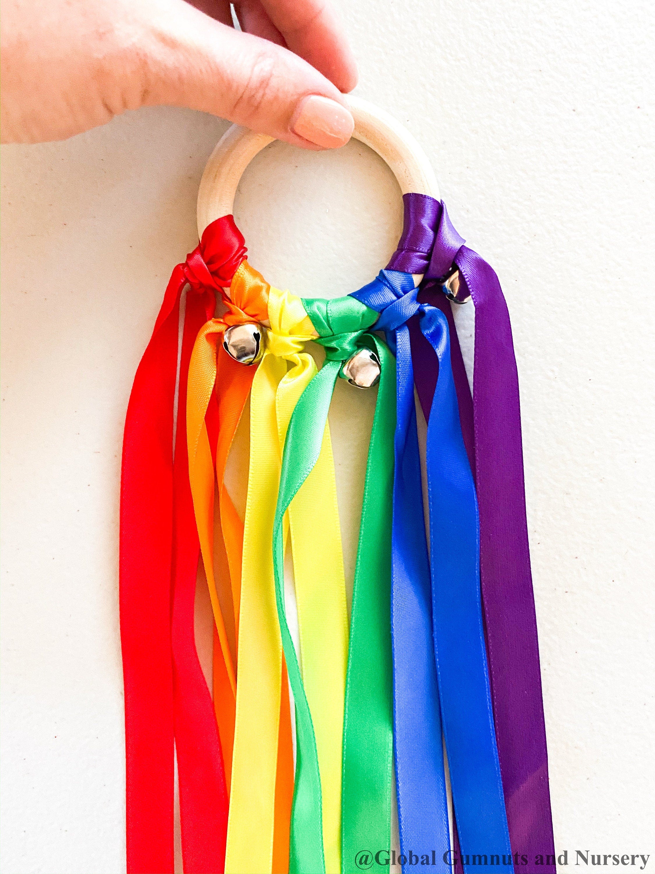 Ribbon Dancing Bells: Colourful musical chimes with ribbons for creative dance and play.
