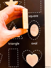 Chunky wooden shape set with 6 playful designs, ideal for teaching shapes, sensory play, and early learning activities.