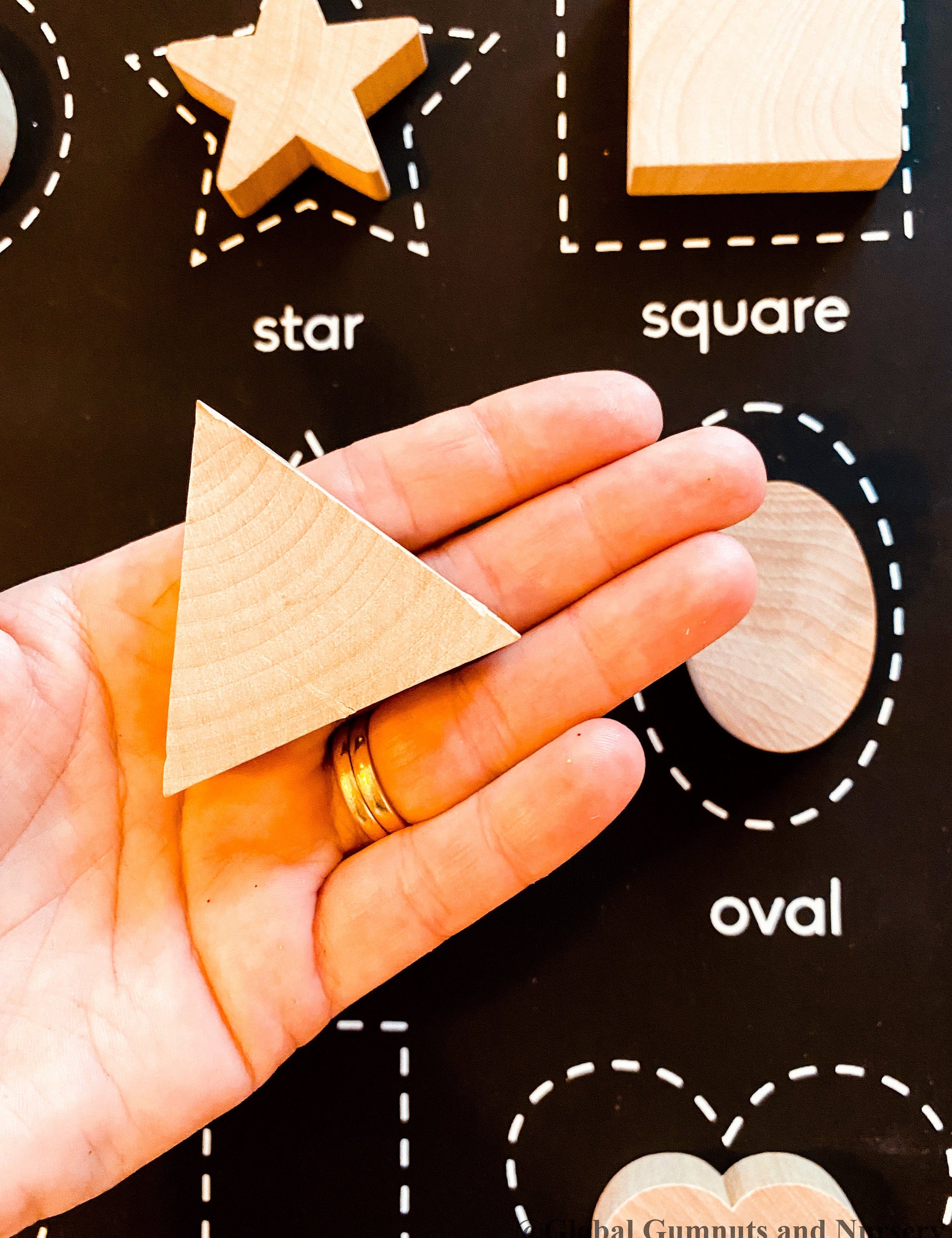 Chunky wooden shape set with 6 playful designs, ideal for teaching shapes, sensory play, and early learning activities.