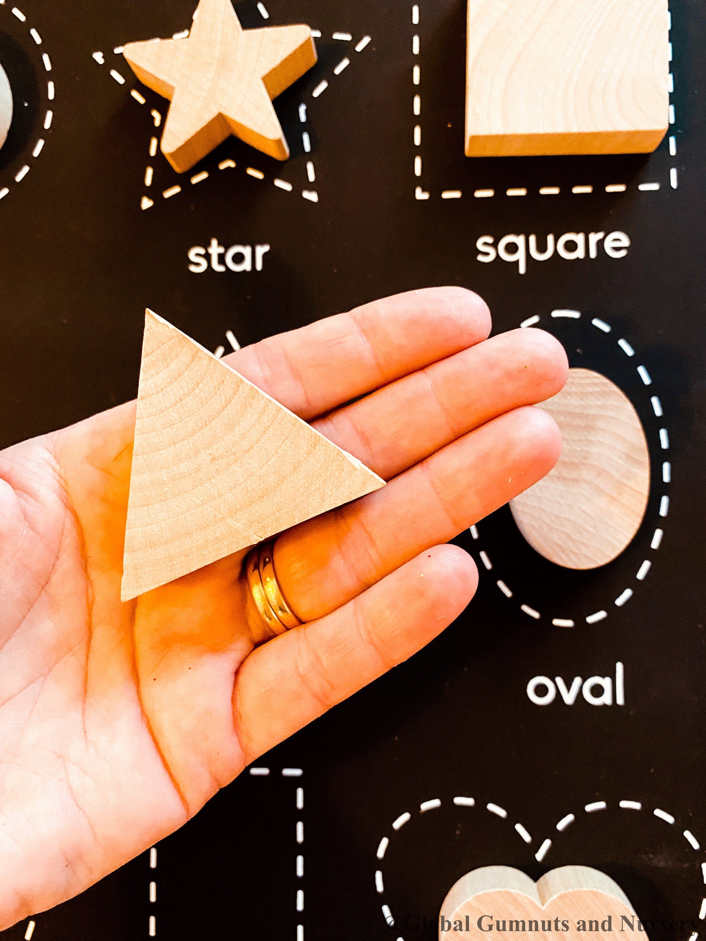 Chunky wooden shape set with 6 playful designs, ideal for teaching shapes, sensory play, and early learning activities.