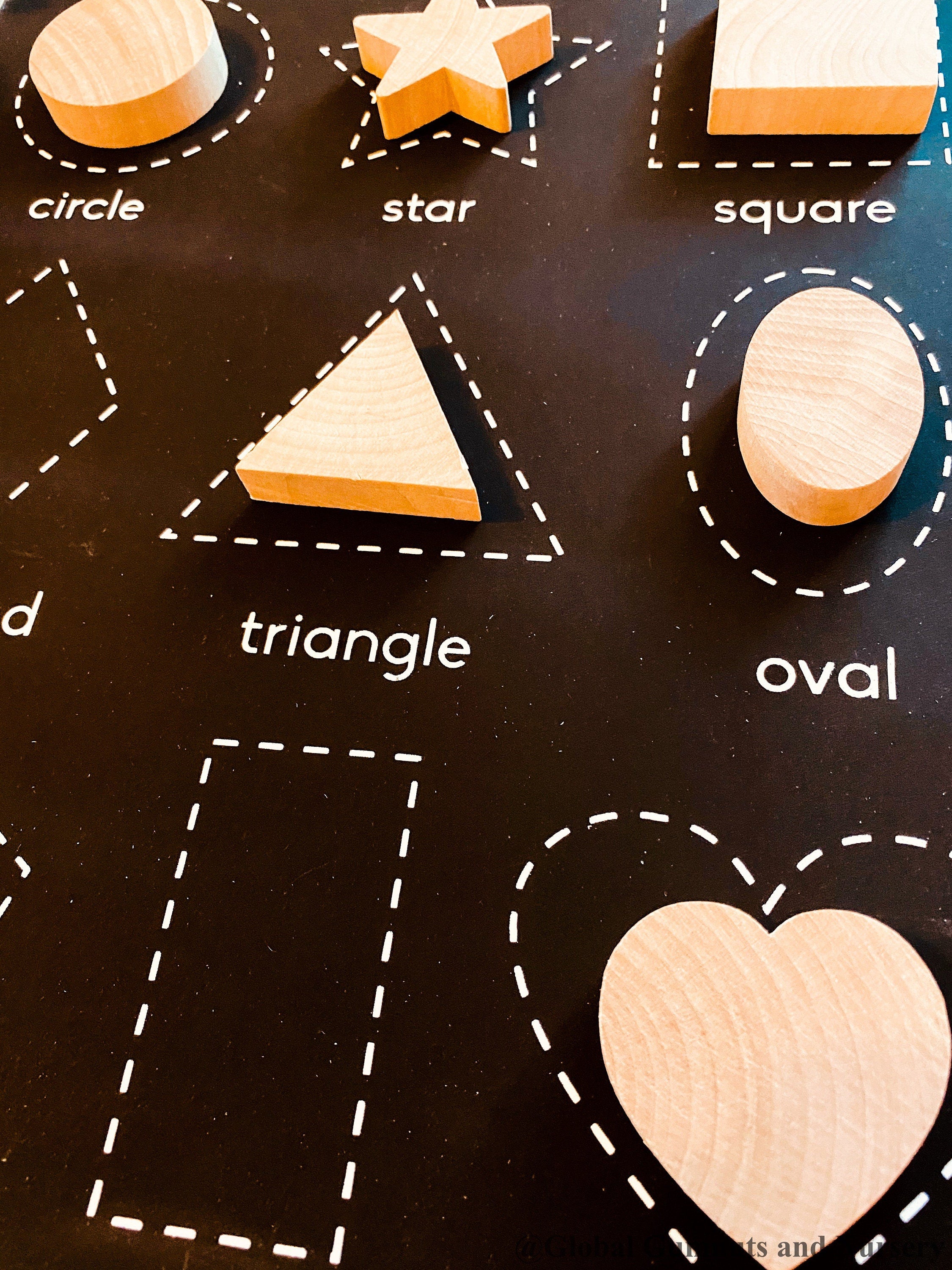 Chunky wooden shape set with 6 playful designs, ideal for teaching shapes, sensory play, and early learning activities.