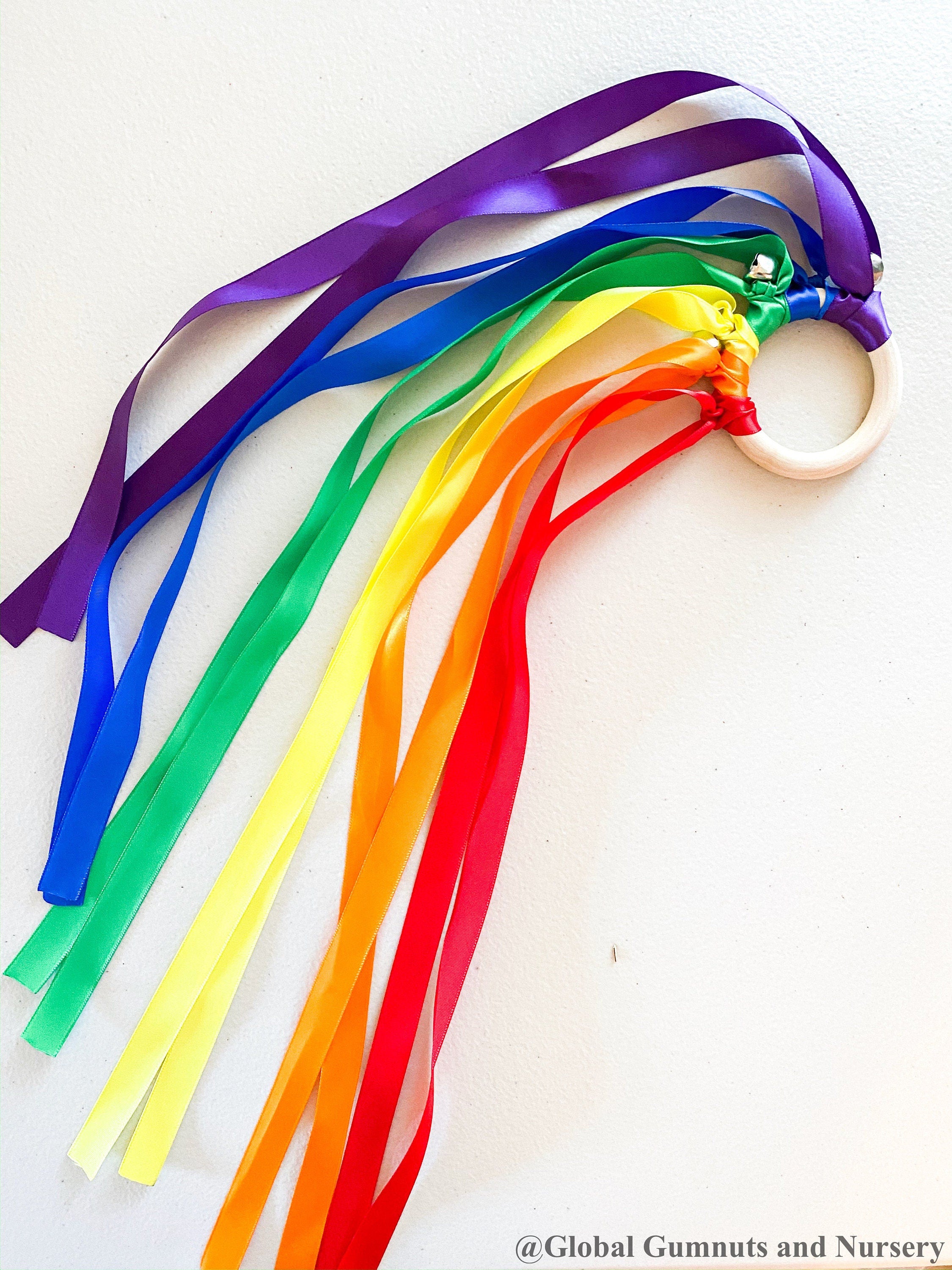 Ribbon Dancing Bells: Colourful musical chimes with ribbons for creative dance and play.