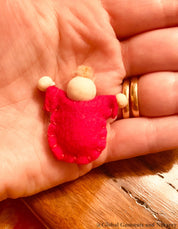 Tiny felt worry dolls, comforting companions designed to help children with big worries.