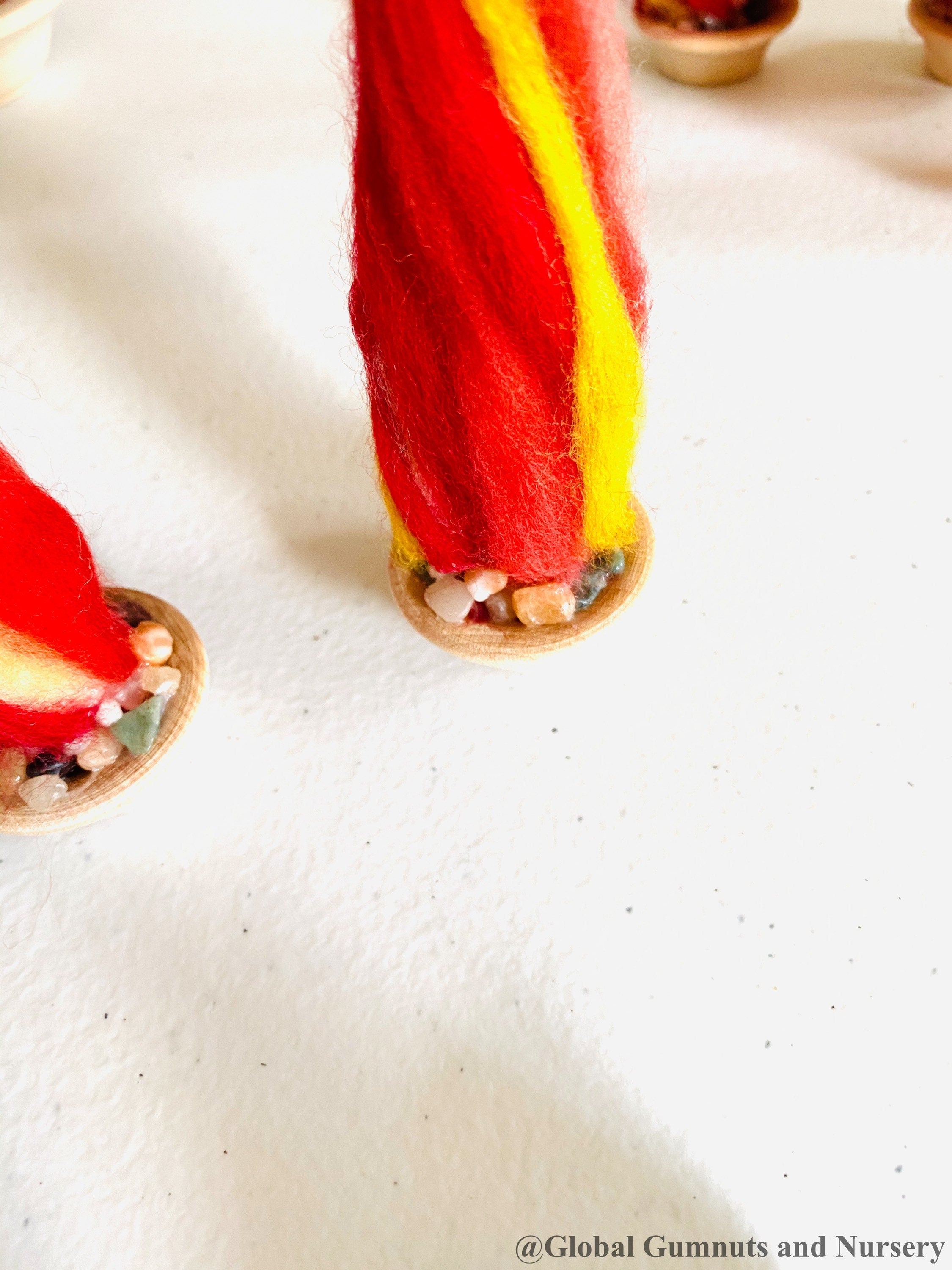 Felt Fireplace Set: Felt fireplace with decorative firewood and stones.