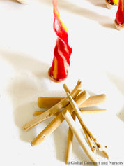 Felt Fireplace Set: Felt fireplace with decorative firewood and stones.