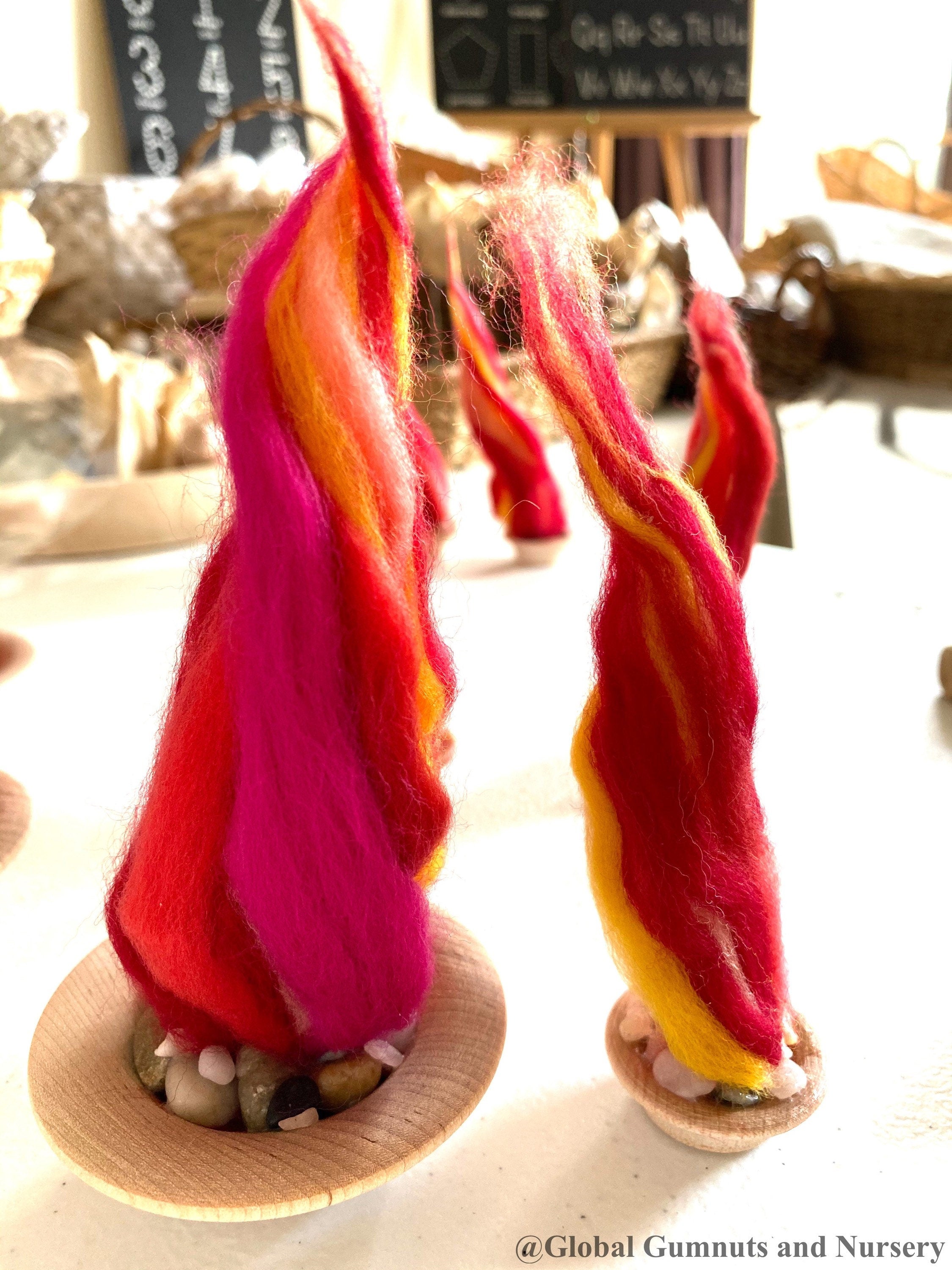 Felt Fireplace Set: Felt fireplace with decorative firewood and stones.