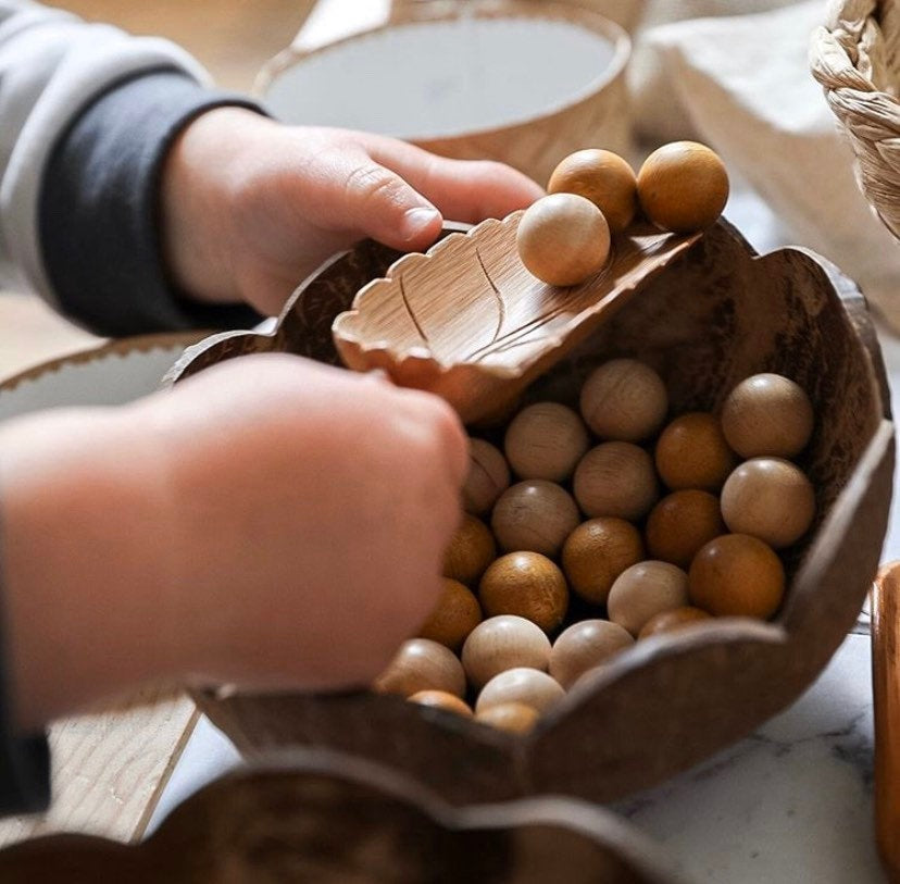 Natural Wood Leaf Spoon: Wooden scoop shaped like a leaf for sensory and craft play.