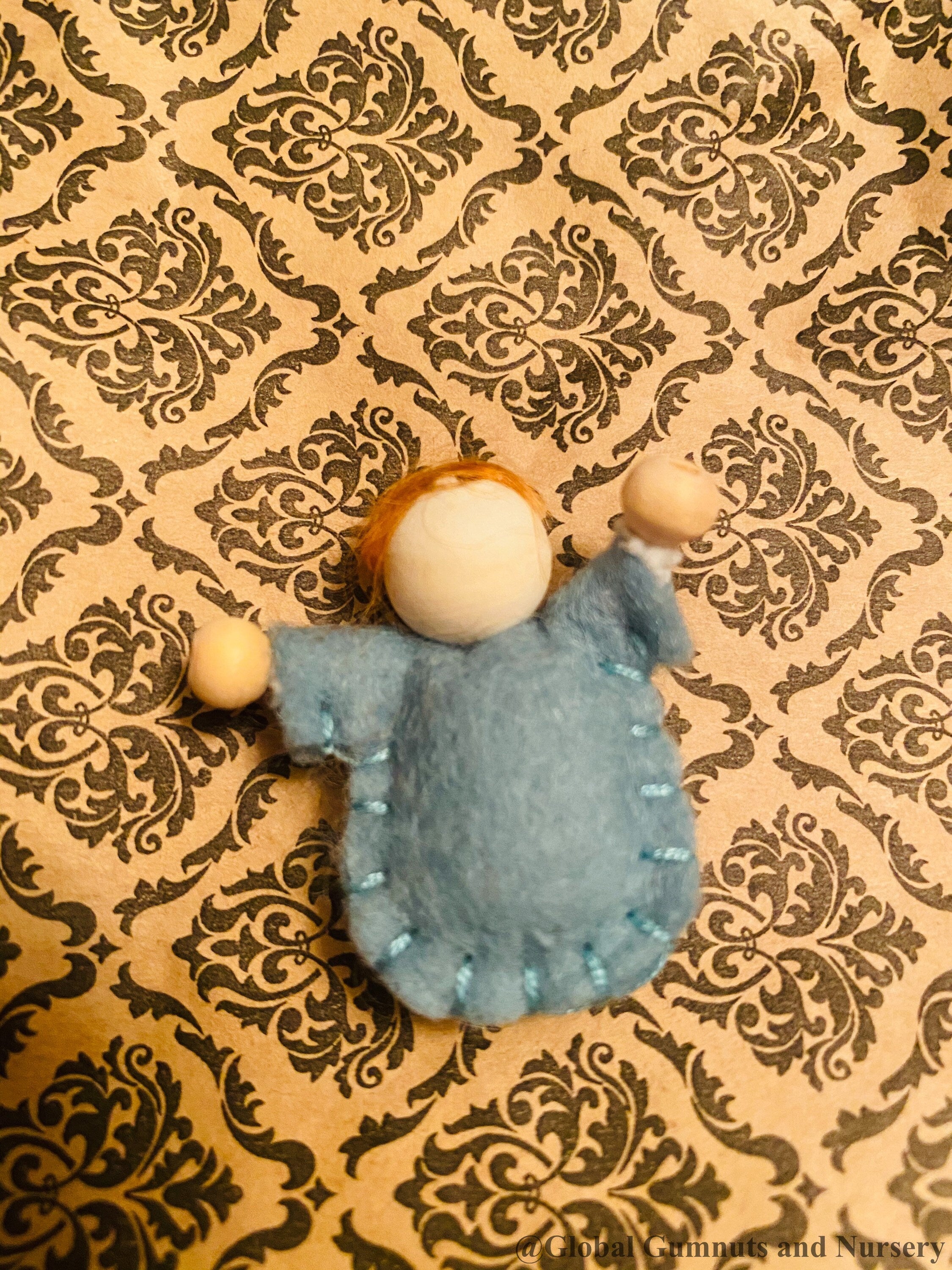 Tiny felt worry dolls, comforting companions designed to help children with big worries.