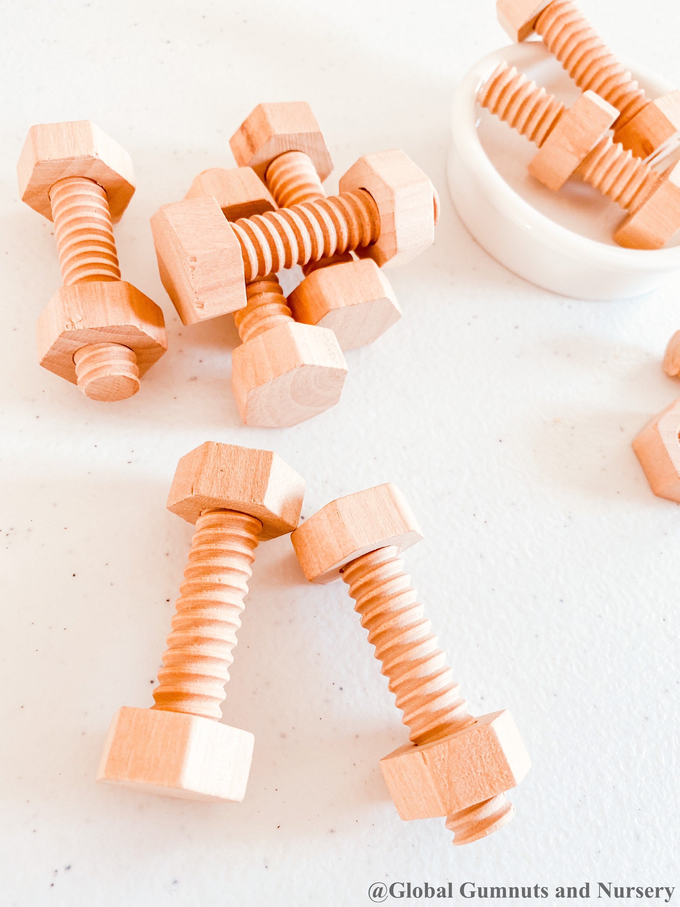 Wooden Nuts & Bolts Set: Six-piece set for motor skill development through play.