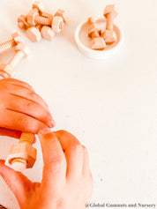 Wooden Nuts & Bolts Set: Six-piece set for motor skill development through play.